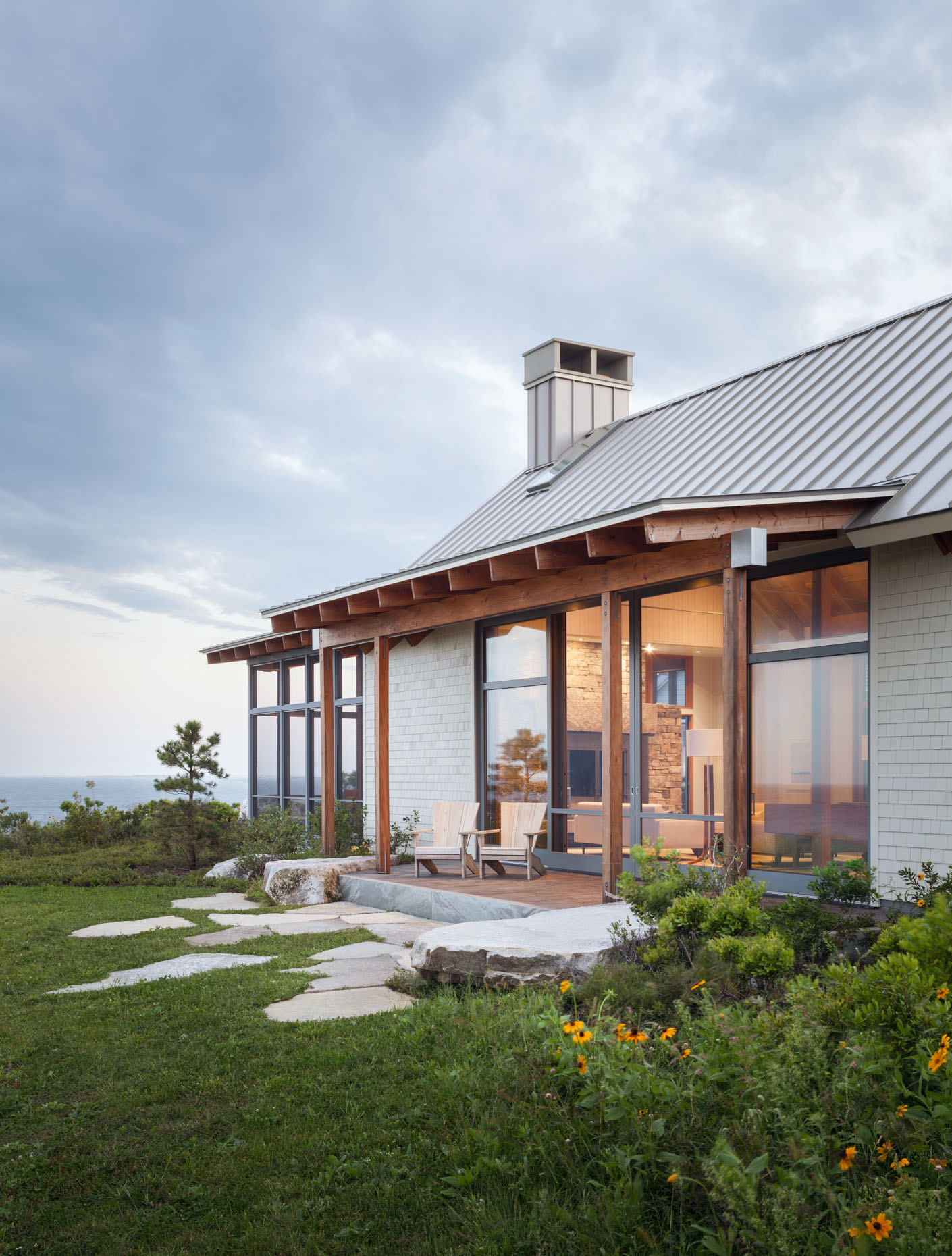 Residential Exterior with dramitc Sky and Stone Landscaping